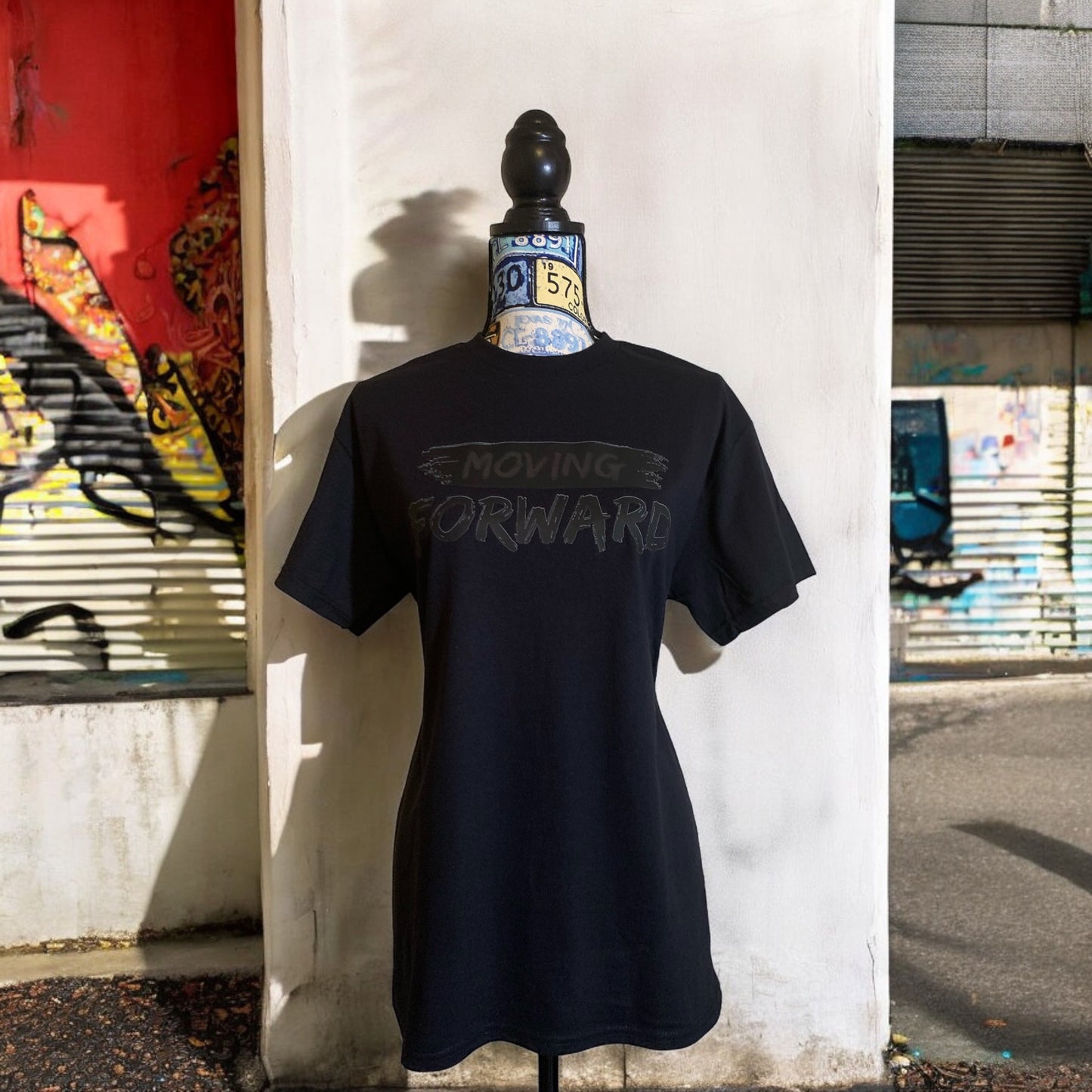 Black Short Sleeve T-shirt with the empowering and inspiring phrase "Moving Forward" in all black. Unisex (Men / Women) **Free Shipping**