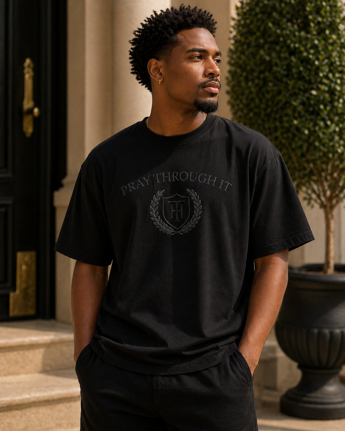 Pray Through It™ Heritage Crest Tee – Tonal Black Edition