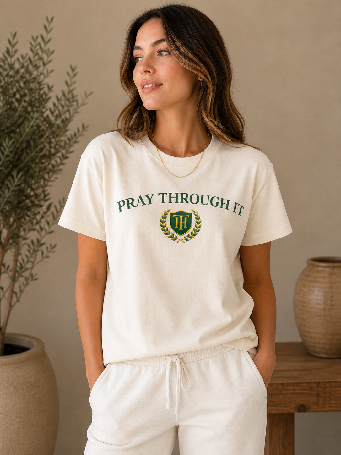 Pray Through It™ Arc Crest Tee – Ivory / Emerald Gold Edition