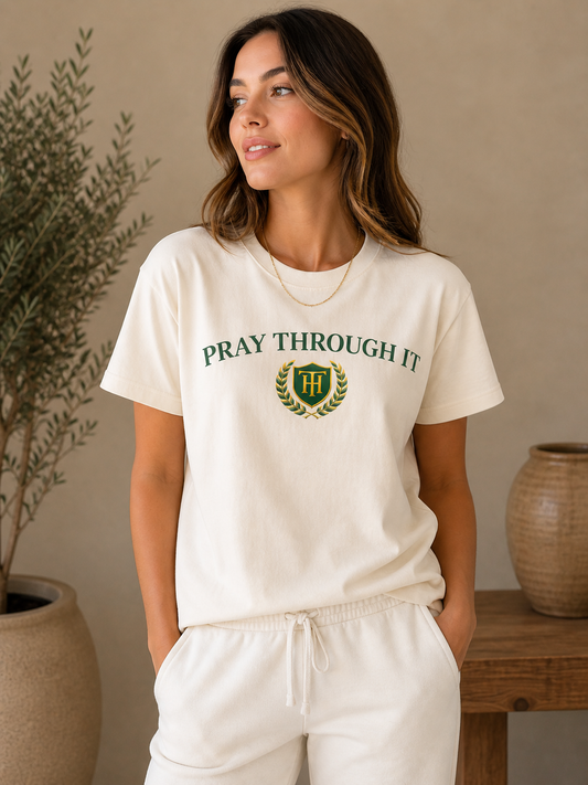 Pray Through It™ Heritage Crest Tee – Ivory/Emerald/Gold Edition