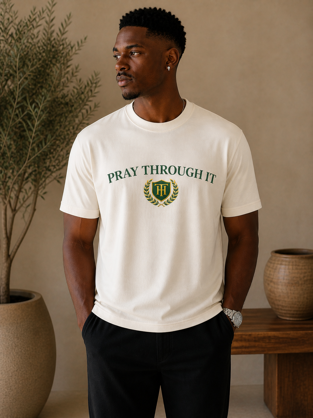 Pray Through It™ Arc Crest Tee – Ivory / Emerald Gold Edition